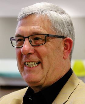 Headshot of Chris Higgins.