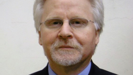 Headshot of George Salmond.