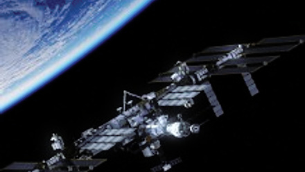 international-space-station-orbiting-planet-earth-picture-id849711212 (1).jpg