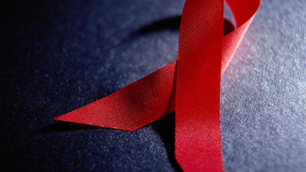 Red ribbon representing HIV/AIDS awareness