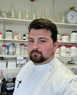 Headshot of Aaron Curtis